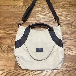 Classic Fashion Outback bag. Tan with pebbled leather handles and trim.